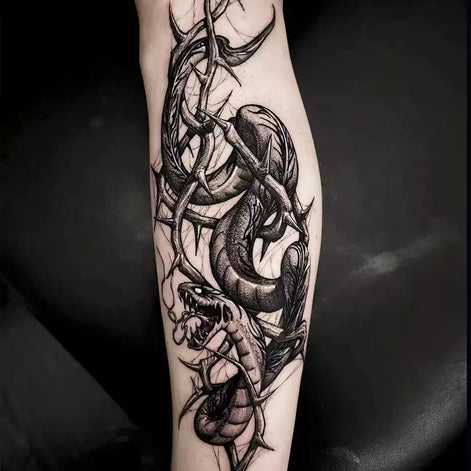 Barbed vine snake temporary tattoo in a narrow vertical format