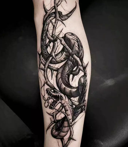 Barbed vine snake temporary tattoo in a narrow vertical format